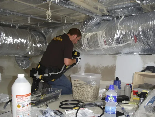 Valley Falls Air Duct Cleaning specialist performing professional mold removal from air ducts in Valley Falls