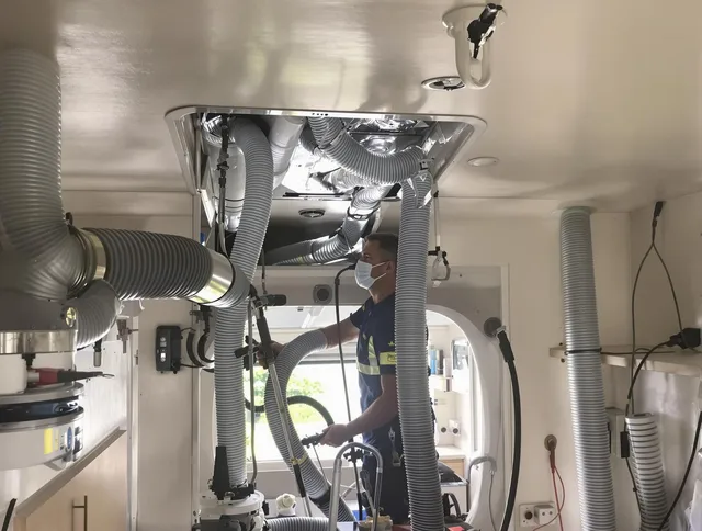 Valley Falls Air Duct Cleaning specialist performing precise mobile home duct cleaning in Valley Falls