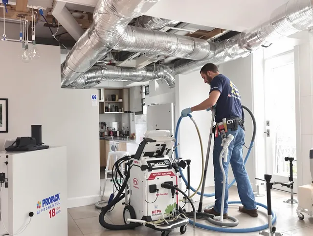 Valley Falls Air Duct Cleaning technician performing advanced pure duct cleaning with specialized equipment in Valley Falls